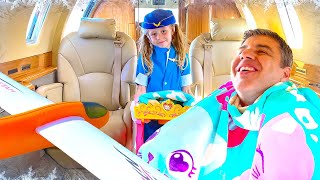 Nastya pretends to be a flight attendant for dad on the plane. Story for kids.