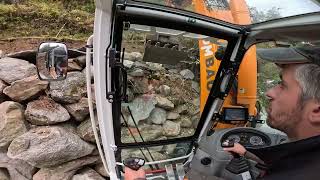 Menzi Muck M335 Stützmauer  walking excavator Ragno schweiz  Gluringen