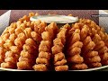 Here's What Really Makes Outback's Bloomin' Onion So Delicious