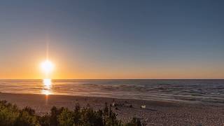 Sunset and sunrise above the Baltic