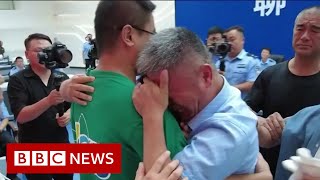 Father reunited with son snatched as baby 24 years ago in China - BBC News