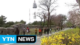 꽃샘추위 속 걷기대회 인파로 북적 / YTN