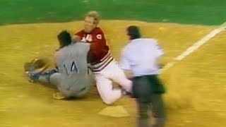 Norm Charlton collides with Mike Scioscia at home plate