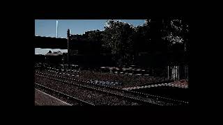 DB Schenker 66091 thunders through Slough