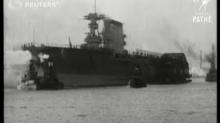 Big US aircraft ship hauled to Navy yard by 20 tugs (1928)