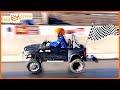 Racing kids power wheels truck, tractor, and ride on race cars. Educational drag racing | Kid Crew