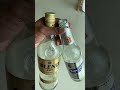 EMPTY WHISKEY AND BEER BOTTLE