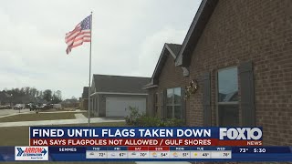 HOA in Gulf Shores says flagpoles not allowed, homeowner fined