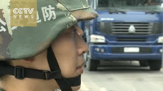 Chinese soldiers help with building and disaster relief