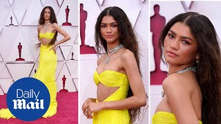 Zendaya looks radiant in yellow dress and $6million worth of diamonds on the 2021 Oscars red carpet