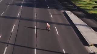 CRAZY guy dangerously crossing 5 lane road traffic