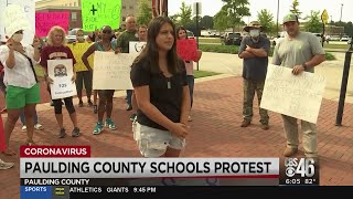 Protesters line Paulding Co. streets over students returning to school