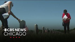Families gather to remember loved ones at Abraham Lincoln National Cemetery