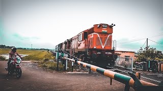 Single Line Train action : Furious Alco Thrashes levelcrossing at full speed with Tiny train