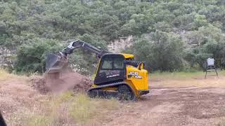 JCB teleskid building a road