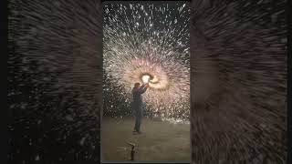 中国非遗文化打铁花The art of playing with molten iron, an intangible cultural heritage of China.