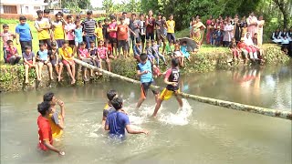 ചെളി നിറഞ്ഞ പാടത്ത് വടംവലി; മഴയുത്സവത്തിൽ തിമിർത്ത് ഊർപ്പള്ളിക്കാർ