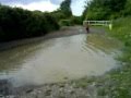 4yr old boy + bike + massive puddle =