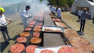 Huge Italian Street Food Festival of Grilled Meat. Ribs, Sausages, Chicken and More Meat