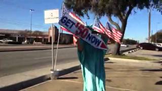 Sign spinner at Liberty Tax Dallas, TX