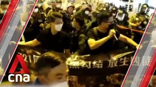 Hong Kong protesters mark anniversary of Yuen Long clashes