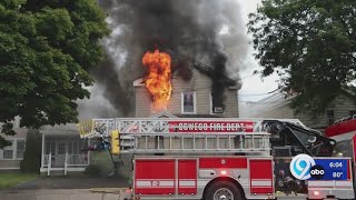 Oswego woman arrested after setting house on fire with people, animals inside, police say