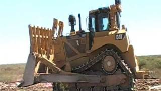 Caterpillar D8T Pushing Garbage And A Little 836 Compactor Action