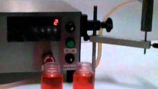 www.autopacker.com  Tabletop Peristaltic Pump Liquid Filler FT-100, professional filling machine