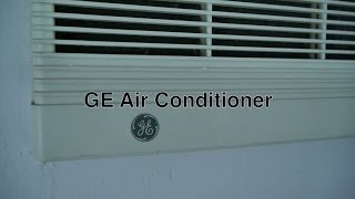 GE Window Air Conditioner Mounted in Room Wall as Cheap Alternative to Ductless or Central Air Units