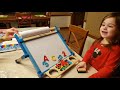 opening and playing with the melissa u0026 doug deluxe double sided tabletop easel the morrone family