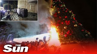 Protesters torch Christmas tree in Albania amid riots over police killing