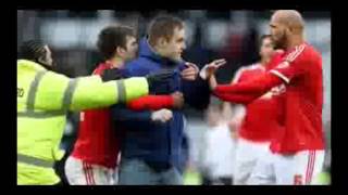 Watch Derby County fan throw PUNCHES at Nottingham Forest Players after invading Pitch!!!