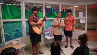 Bruno Mars’ family visit keiki at Kapiolani Medical Center