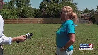 Choctaw woman has fence fixed for free