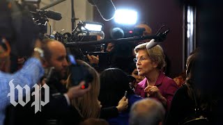 In the spin room, Warren slams Bloomberg yet again