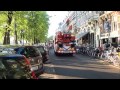 **primeur** brandweer amsterdam met nieuwe autospuit beheer alw en politie naar woningbrand