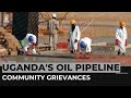 Uganda's new oil pipeline: Communities allege intimidation, unfair compensation