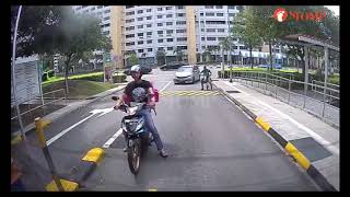 Count how many times this GrabFood rider narrowly avoids hitting vehicles and pedestrians at Pasir R