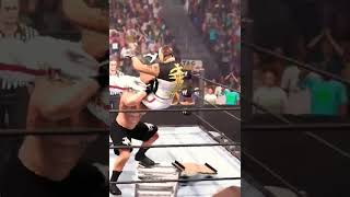 WWE 2K22 Brock Lesnar Powebomb Rey Mysterio Through The Table #shorts #wwe2k22 #trending