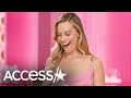 Margot Robbie REACTS To Seeing Herself As Barbie Doll