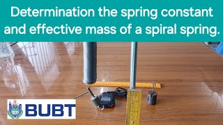 Determination the spring constant and effective mass of a spiral spring