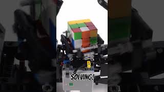 LEGO Technic Car 42160 solves a Rubik's Cube