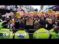 In full: Aerial view of London as thousands of counter-protesters crowd out far-Right rallies