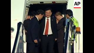 Ousted Thai PM Thaksin arrives in London