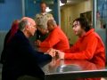 Larry comforts Dr. Bright in prison