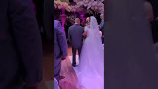 Bride Defies Nerves to Sing Herself Down the Aisle