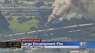 Fire Burns at Large Encampment Near Interstate 280 in San Francisco