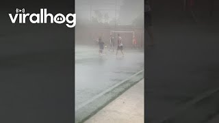 Playing Football In The Pouring Rain || ViralHog