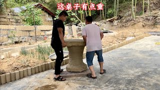 这桌子有点重，院子遮阳网