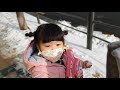 3 years old half korean half japanese girl plays in snow